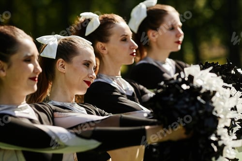 Preview: Group of cheerleading girls with pompom
