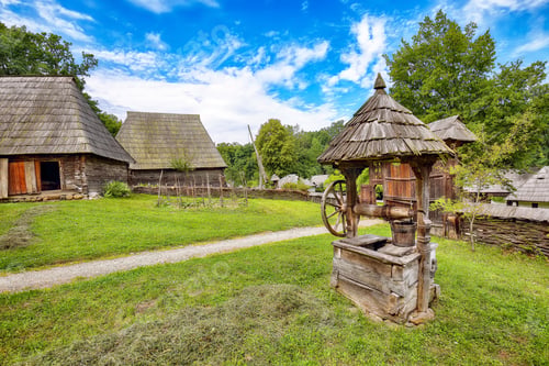 Preview: Gorgeous summer scene of traditional romanian peasant houses.