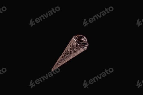 Preview: top view of one black ice cream isolated on black