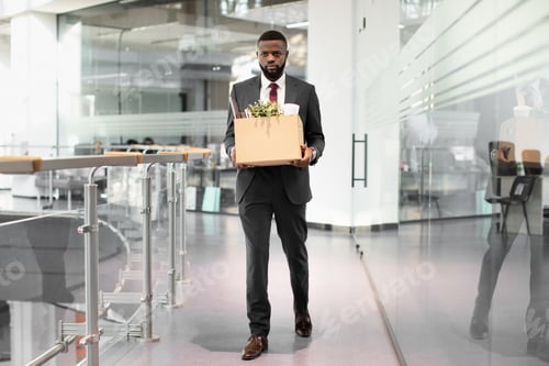 Preview: Unhappy african american young man employee with working stuff