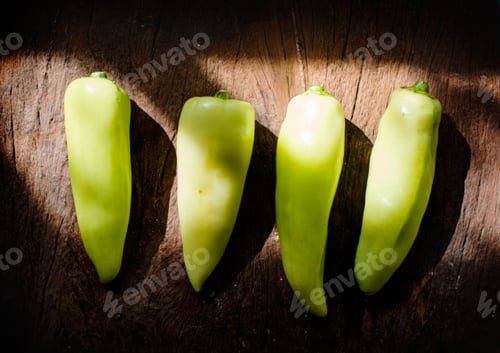Preview: Aerial view of fresh jalapeno pepper on wooden background