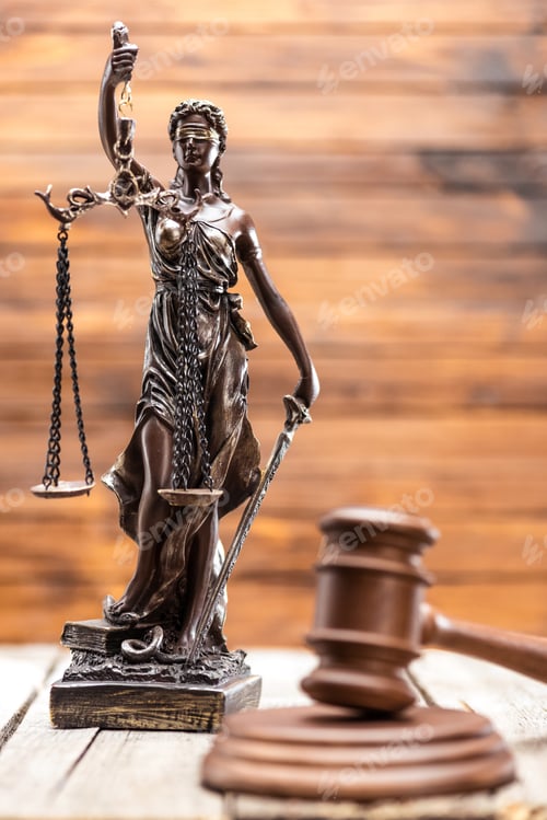 Preview: Statue of lady justice and mallet on wooden table, Law concept