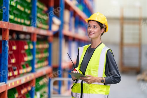 Preview: Warehouse workers checking the inventory.