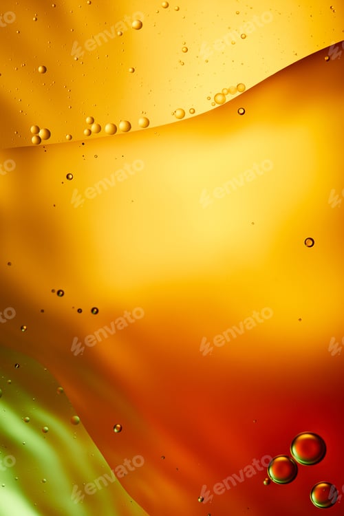Preview: Beautiful abstract background from mixed water and oil in orange, red and green color