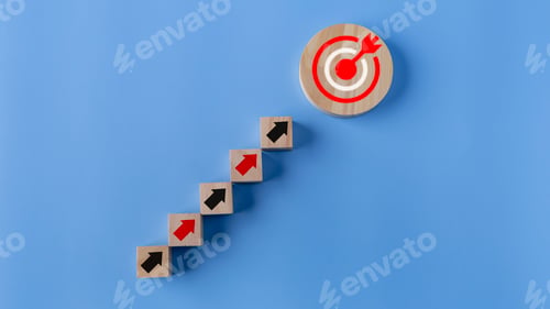 Preview: Wooden blocks with arrow and target on blue background. Success concept. Business achievement goal