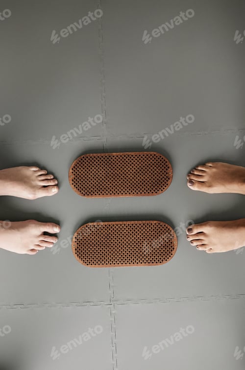 Preview: Feet Standing By Sadhu Nail Board in Yoga Studio