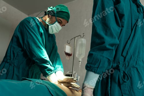 Preview: surgeon giving cpr to patient in operating room