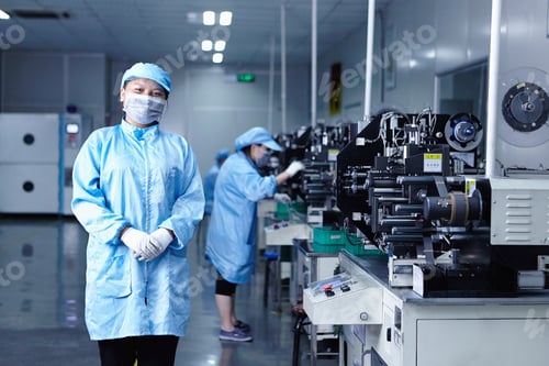 Preview: Worker at e-cigarettes battery factory, Guangdong, China