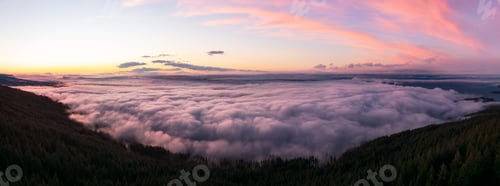 Preview: Clouds covering Canadian Mountain Landscape. Aerial Background
