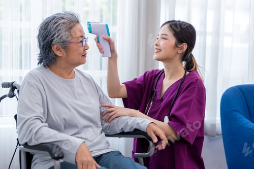 Preview: Caregiver nurse take care a Senior patient walking in park. Nurse helping senior Woman