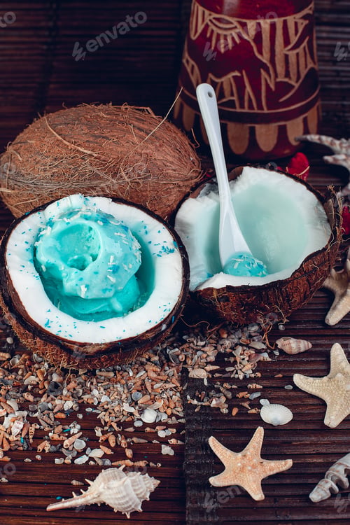 Preview: Blue ice cream in coconut bowl. Summer vacation