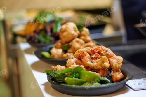 Preview: Closeup shot of shrimp tempura with vegetables