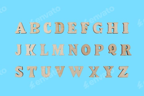 Preview: wooden letters of the English alphabet on a blue background