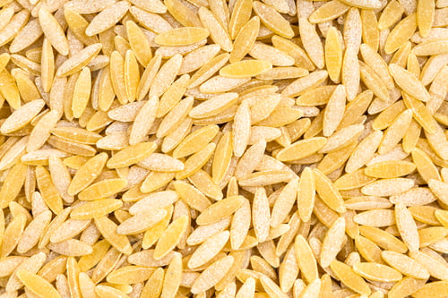 Preview: background - uncooked orzo risoni pasta