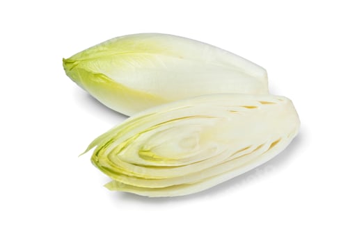 Preview: Whole and half fresh raw Belgian endive
