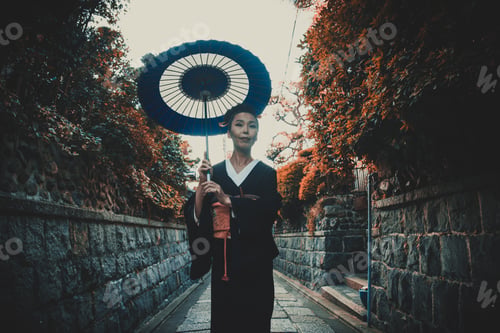 Preview: Beautiful japanese senior woman walking in the village. Typical japanese traditional lifestyle