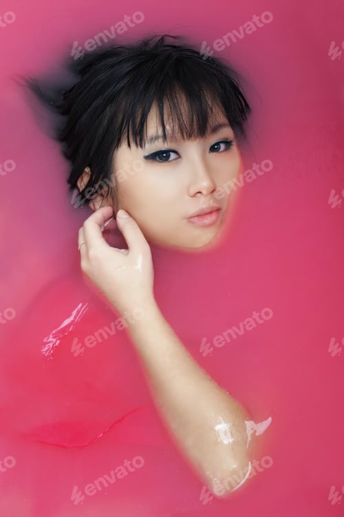 Preview: Face Of Beautiful Woman From The Water, Top View