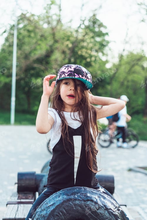 Preview: preschool girl sitting on top of a cannon