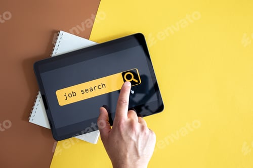 Preview: Top view of digital tablet with search job on screen in male hands.