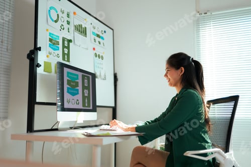 Preview: Woman working on ESG sustainability report in office