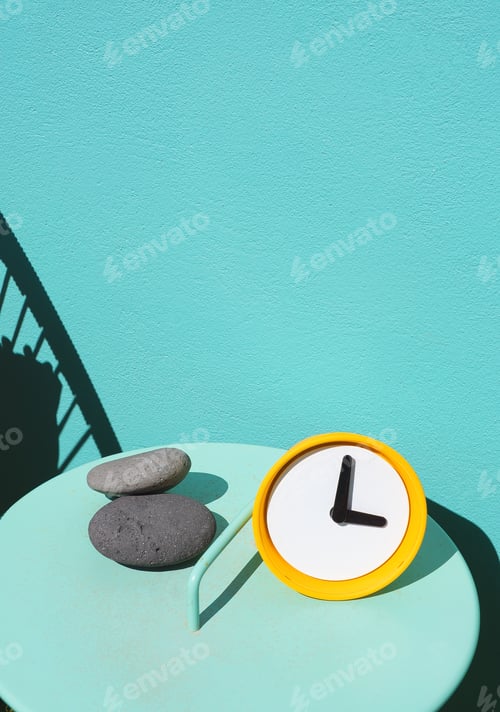 Preview: Home decor stones and alarm clock. Sea, summer aesthetic wallpapers. Vacation time concept