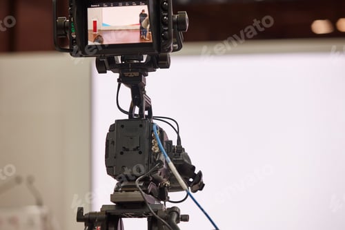 Preview: Television set with video camera and white screen. Broadcasting