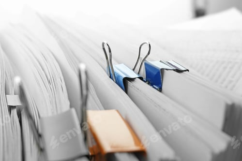 Preview: Pile of documents with colorful binder clips