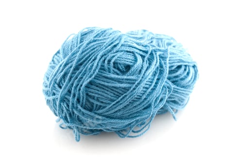 Preview: Ball of Blue Yarn on a White Background