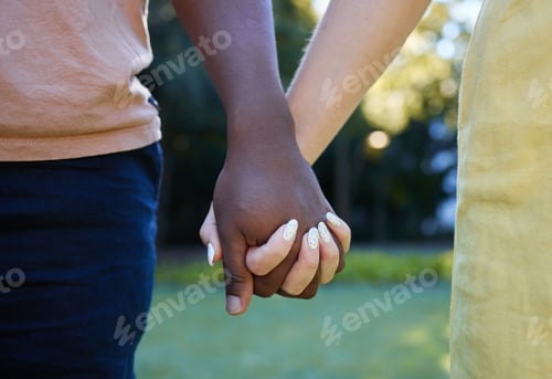 Preview: Interracial, couple holding hands and trust, love outdoor in nature and commitment, support in rela