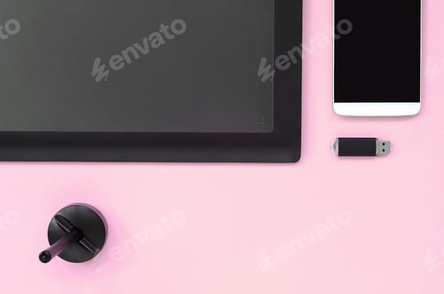 Preview: Graphic tablet and pen for illustrators and designers lies with USB memory card and smartphone on