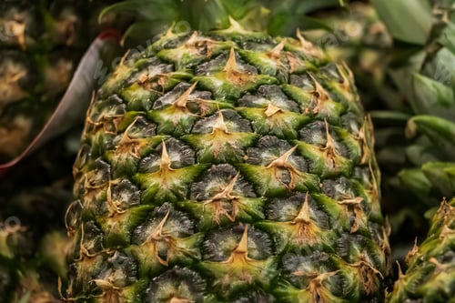 Preview: Ripe pineapples in the store. Tropical fruits for diet food.