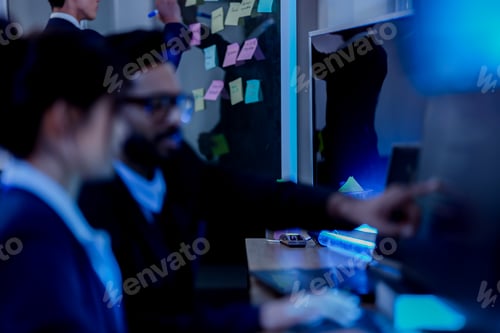 Preview: diverse team of AI developers celebrates a successful breakthrough