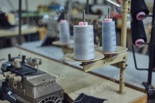 Preview: Image of a lot of coils with a threads at the sewing workshop.