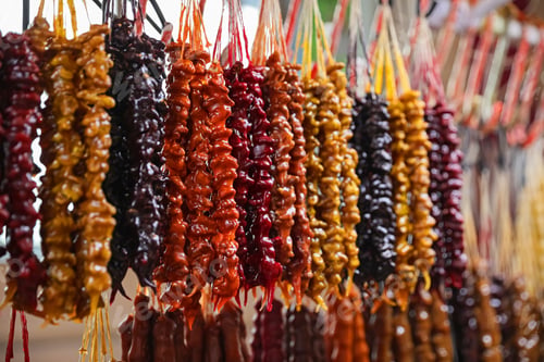 Preview: Bunches of different delicious churchkhelas at market