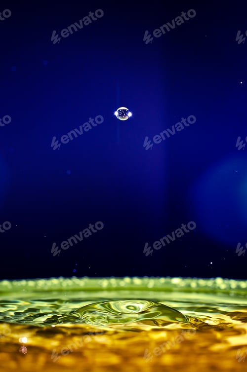 Preview: The water drop with interesting colorful blurred background