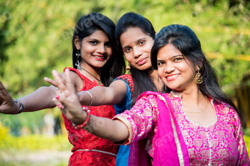 Preview: Happy Indian young girls smiling and having fun at outdoor.