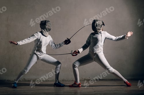 Preview: Fencer woman with fencing sword. Fencers duel concept