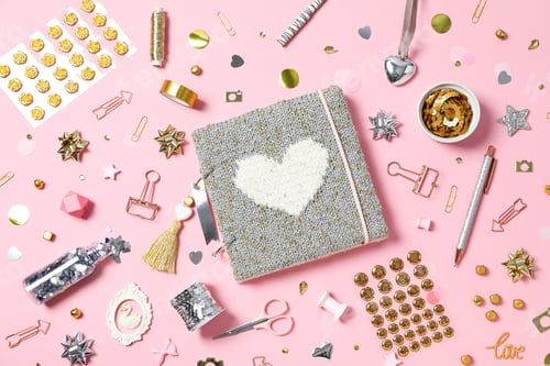 Preview: Scrapbooking, on a pink background, top view.