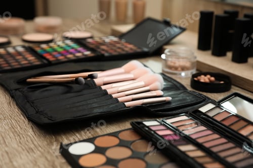 Preview: Professional makeup artists workplace with tools and cosmetic, closeup