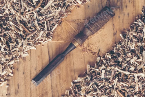 Preview: Carpenter tools on wooden table with sawdust. Carpenter workplace top view