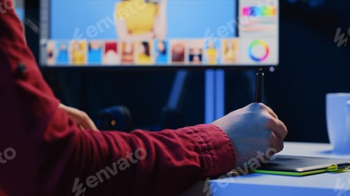 Preview: Photographer adjusting white balance on overexposed pictures using graphic tablet and stylus
