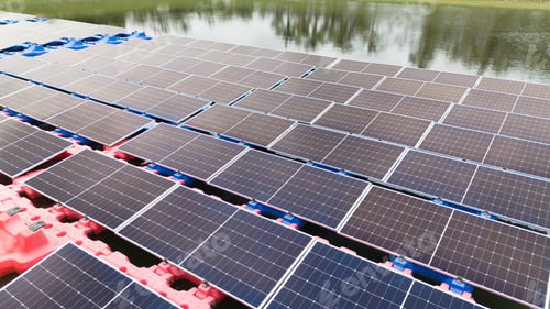 Preview: Drone view of Floating Solar Panel. Solar photovoltaic panel PV System in Industry lake water pond