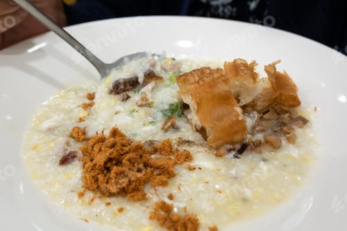 Preview: Famous Taiwanese Snacks, Congee With Pork And Century Eggs, Closeup Image