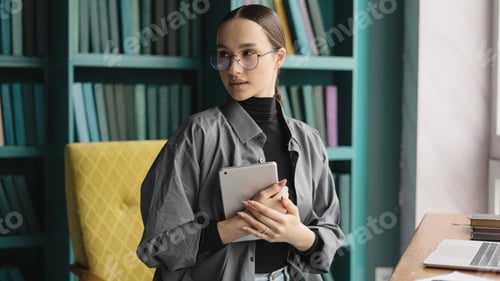 Preview: woman in office online call colleagues screen laptop computer conference