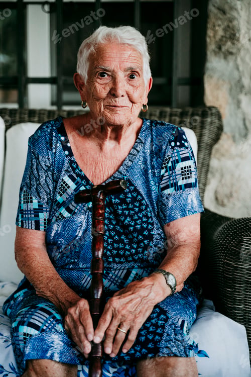 Preview: portrait of old lady in her 80s relaxed at home.