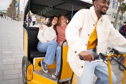 Preview: The happy young couple enjoy their honeymoon vacation by riding in a tuk tuk.