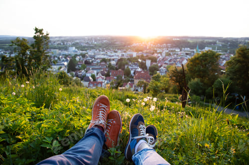 Preview: Couple enjoy beautiful city view in the sunset