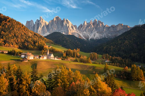 Preview: Autumn landscape with church with Dolomites mountains