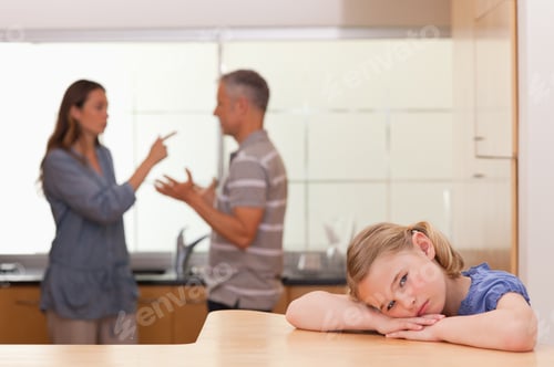 Preview: Sad Little Girl Listening Her Parents Having An Argument In A Kitchen