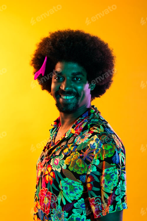 Preview: African man portrait in studio on colorful background